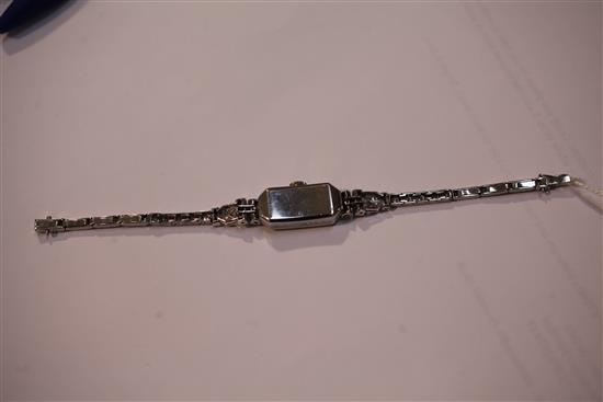 A ladys 1930s/1940s platinum and diamond Crusader cocktail watch, length 6.25in.